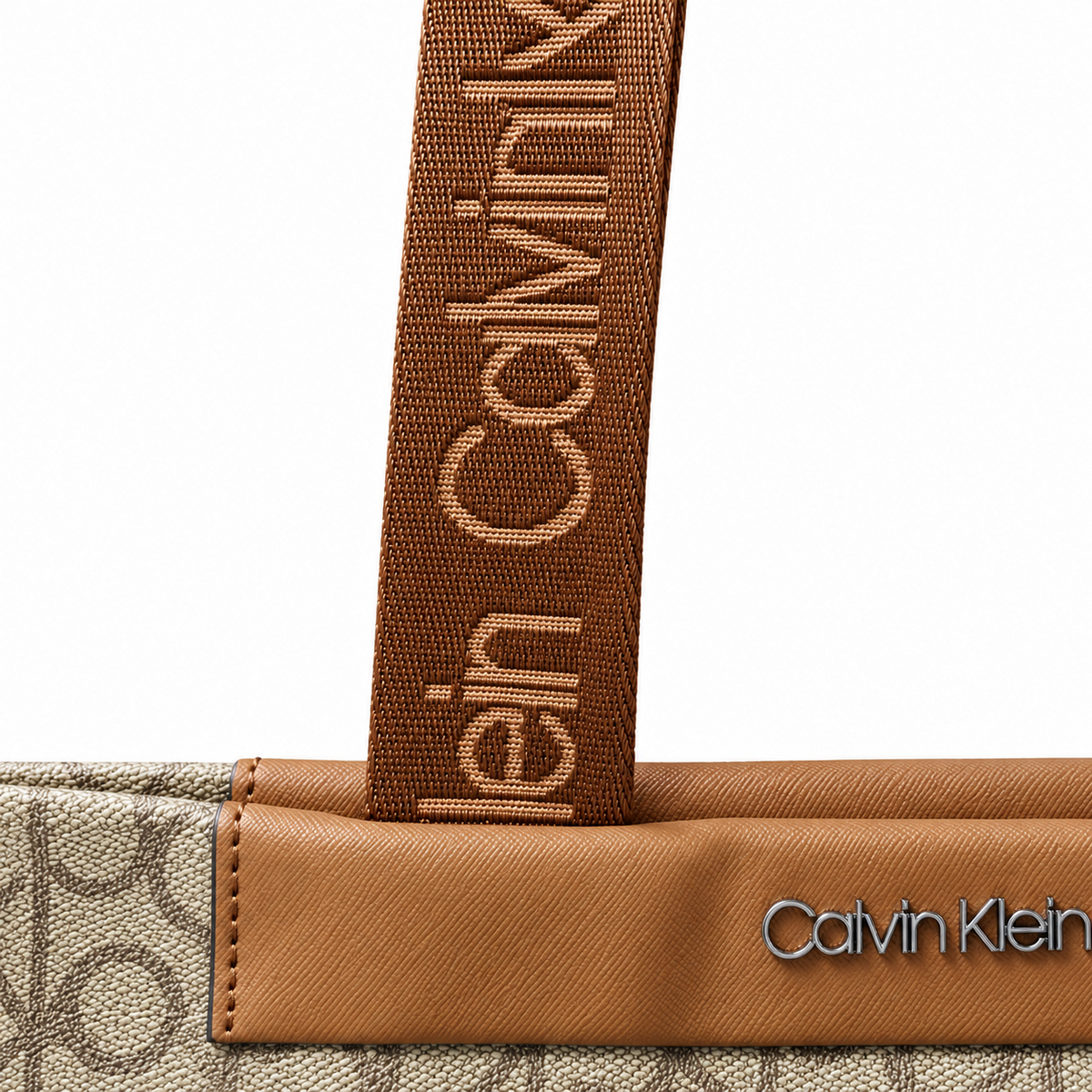 Calvin Klein beige monogram tote bag handle detail